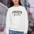 Retro Fourth Grade Camo Back To School Girls Boys 4th Grade Youth Crewneck Sweatshirt Retro Fourth Grade Camo Back To School Girls Boys 4th Grade Youth Crewneck Sweatshirt