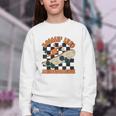 Rolling Into Kindergarten Retro Groovy Back To School Kids Youth Crewneck Sweatshirt