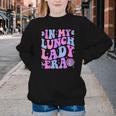 Groovy In My Lunch Lady Era Cafeteria Back To School Youth Crewneck Sweatshirt Groovy In My Lunch Lady Era Cafeteria Back To School Youth Crewneck Sweatshirt