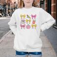 Apple Coquette Bow Books First Day Of School Back To School Youth Crewneck Sweatshirt Apple Coquette Bow Books First Day Of School Back To School Youth Crewneck Sweatshirt