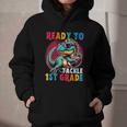 First Day Back To School 1st Grade Boys Football Dinosaur Graphic Youth Hoodie First Day Back To School 1st Grade Boys Football Dinosaur Graphic Youth Hoodie