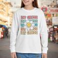 Groovy 1st Grade Back To School First Day Of First Grade Youth Long Sleeve Tee Groovy 1st Grade Back To School First Day Of First Grade Youth Long Sleeve Tee
