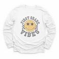 Retro First Grade Vibes Smile Face Back To School 1st Grade Youth Long Sleeve Tee